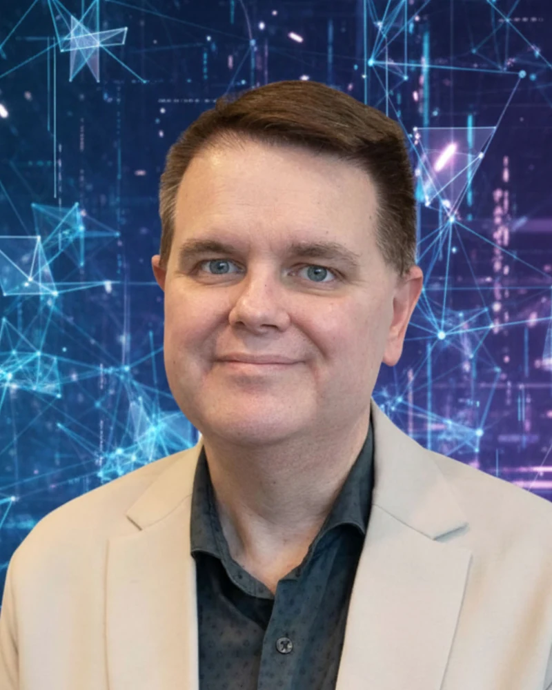 Mark Vos, AI safety and cybersecurity keynote speaker, head and shoulders portrait in a cream blazer over a dark patterned shirt, against a blue and purple digital network background